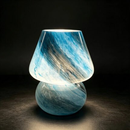 Blue glass mushroom lamp turned on