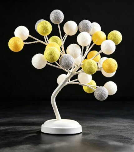 Kapok tree lamp in off state, no glow, cotton ball bulbs on dark black background, home decorative bedside tree light